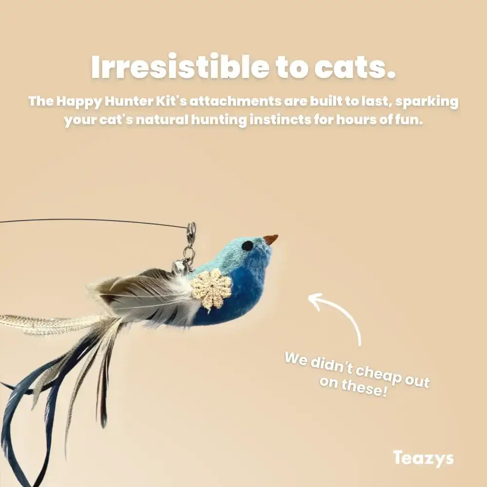 Meet the HAPPY HUNTER KIT—a feathered cat toy with a blue bird design that encourages natural hunting instincts. This durable toy is labeled "Irresistible to cats" and promises quality: "We didn’t cheap out on these!.