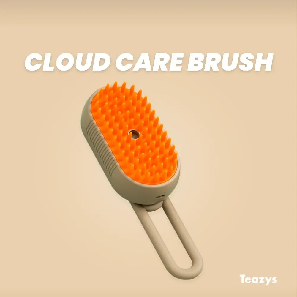 The CLOUD CARE BRUSH, an orange silicone massage tool with a convenient loop handle, is elegantly displayed against a beige background for ultimate care.